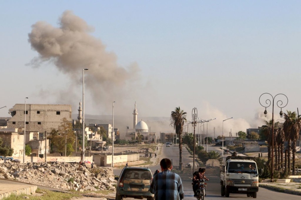 Smoke rises after an airstrike in the rebel held area of old Aleppo