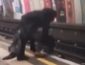 За секунду до: двоих мужчин вытянули из под колес поезда (ВИДЕО)