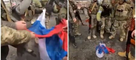 "Слава Україні" та "Хай живе Грузія": військові у Гостомелі святково спалили російський прапор (відео)